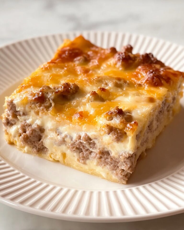 Breakfast Casserole with Crescent Rolls, Sausage, Eggs, and Cheddar Recipe