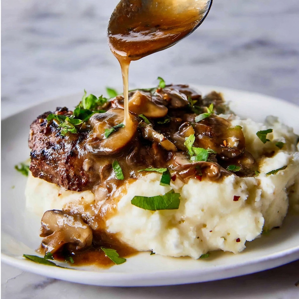 Easy Salisbury Steak with Mushroom Gravy and Creamy Mashed Potatoes Recipe - Recipe Image